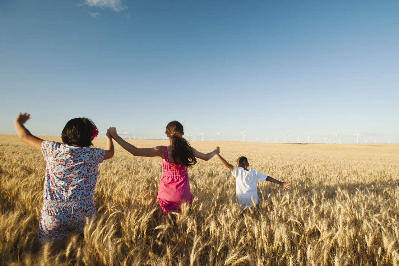 children running in a field